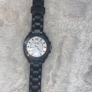 Like new black and silver women’s Coach watch